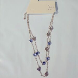 NWT gold necklace with blue hearts/gems
